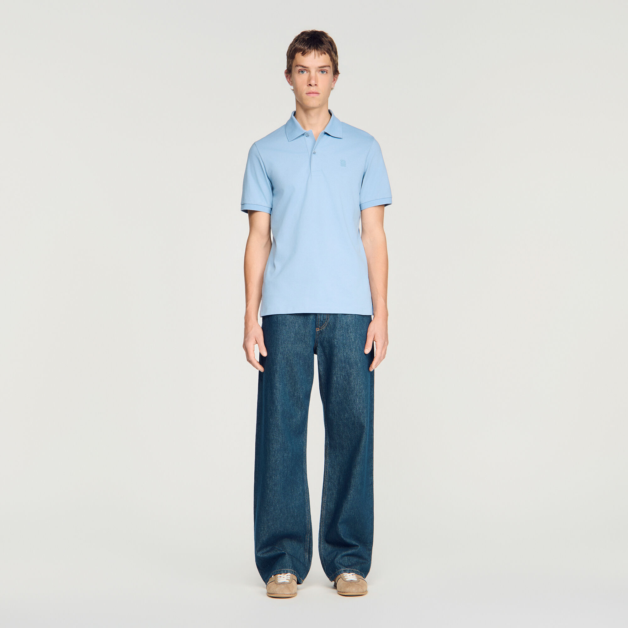 Cotton polo shirt with leather logo