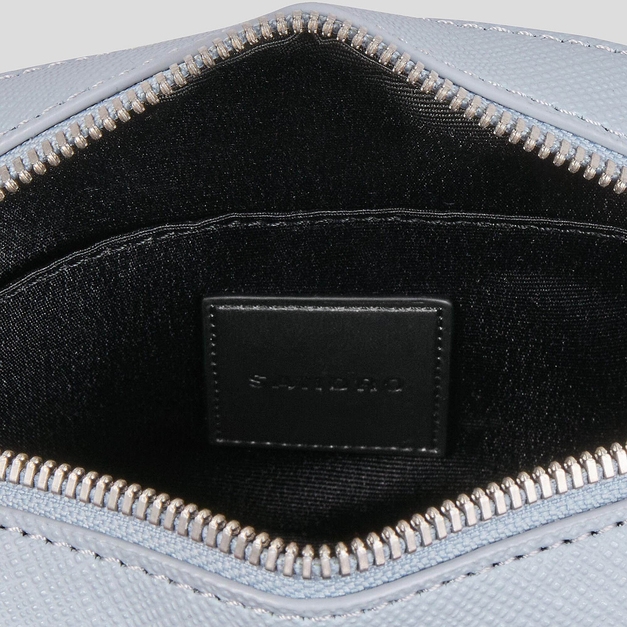 Small reconstituted leather bag