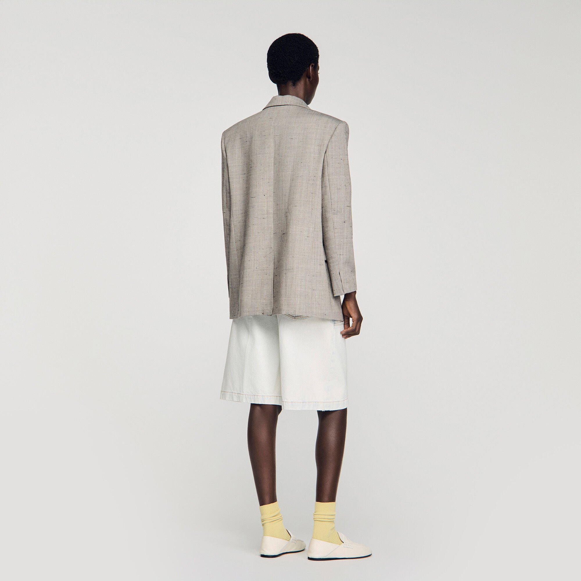 Checked wool jacket with brooch