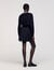 Short skirt with stitched pleats