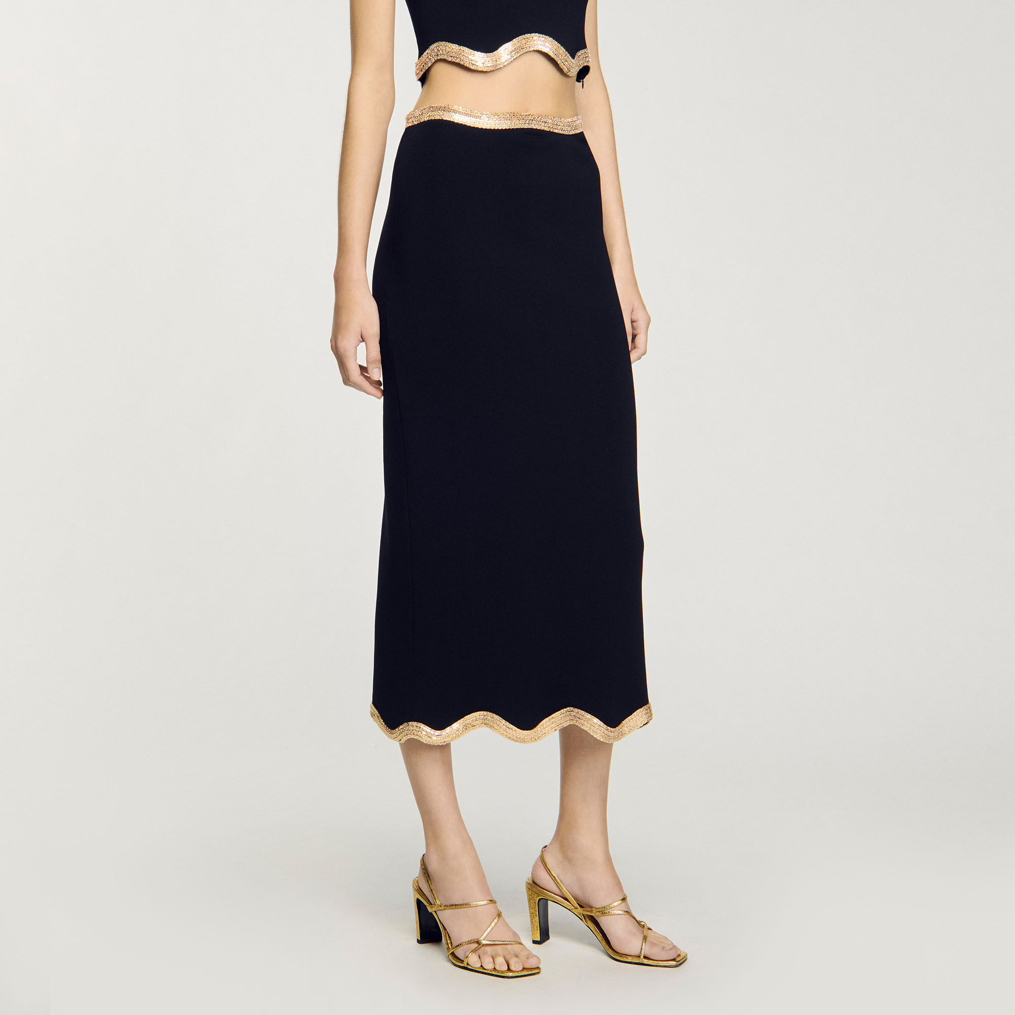 Long knitted skirt with chain detail