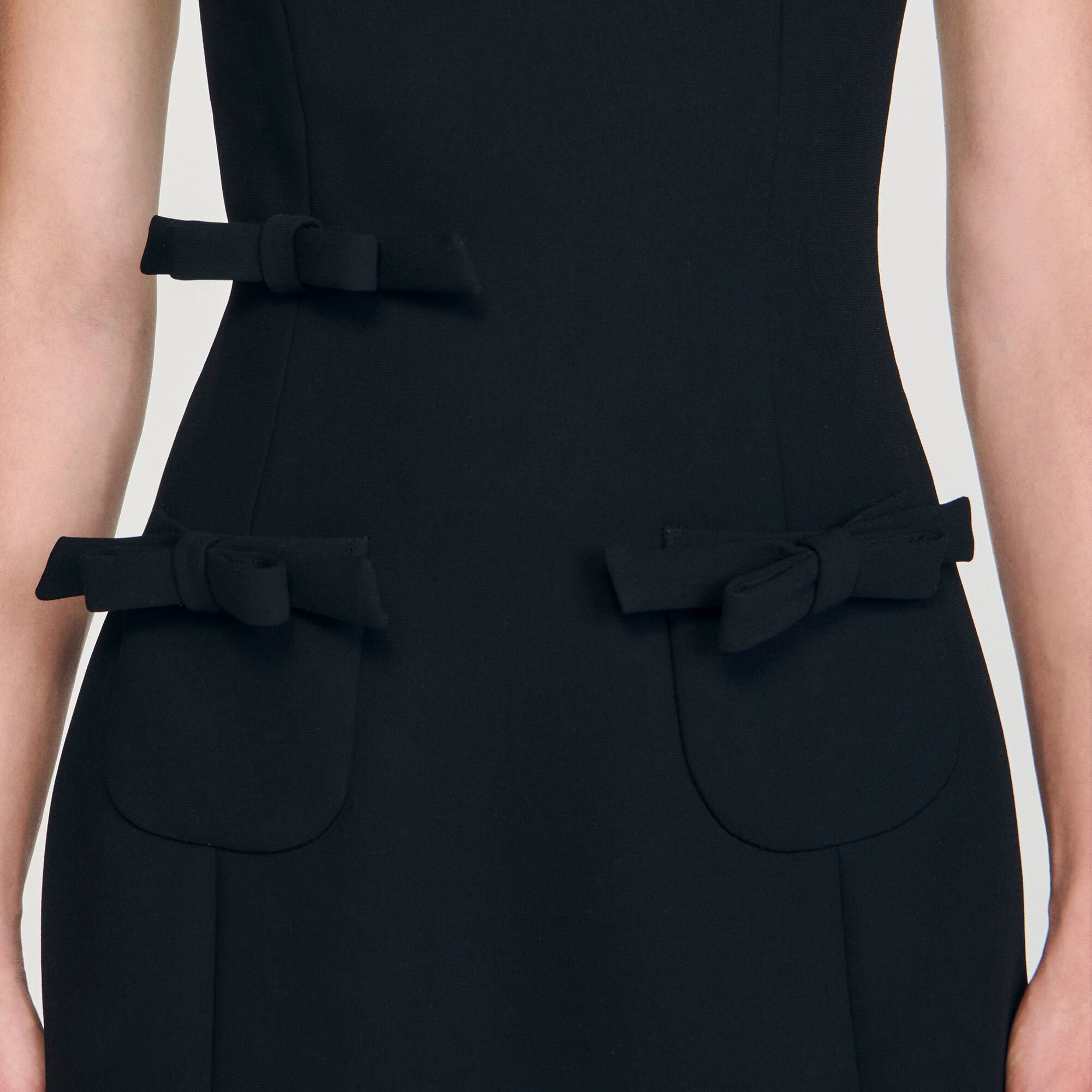 Short dress with bows