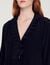 Silk top with pleat edged neckline