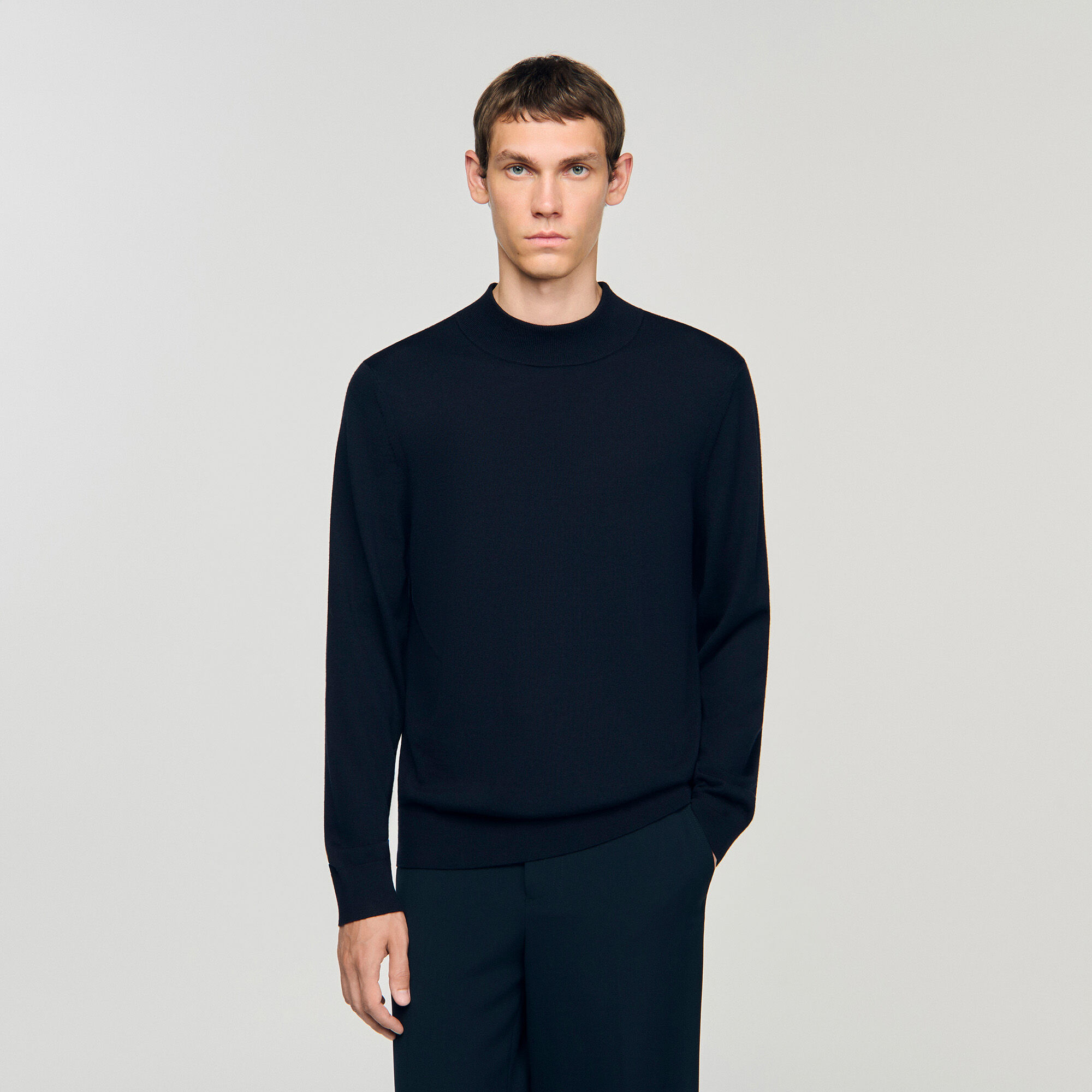 Wool jumper with a high collar