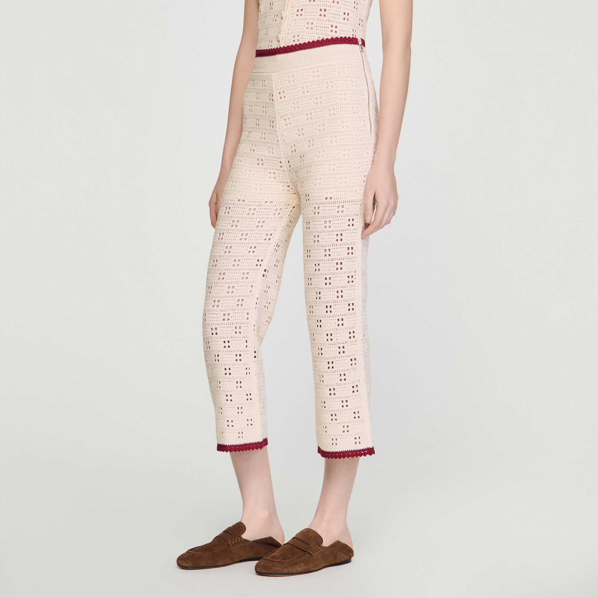 Crochet-look knit trousers