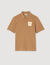 Polo shirt with flower patch