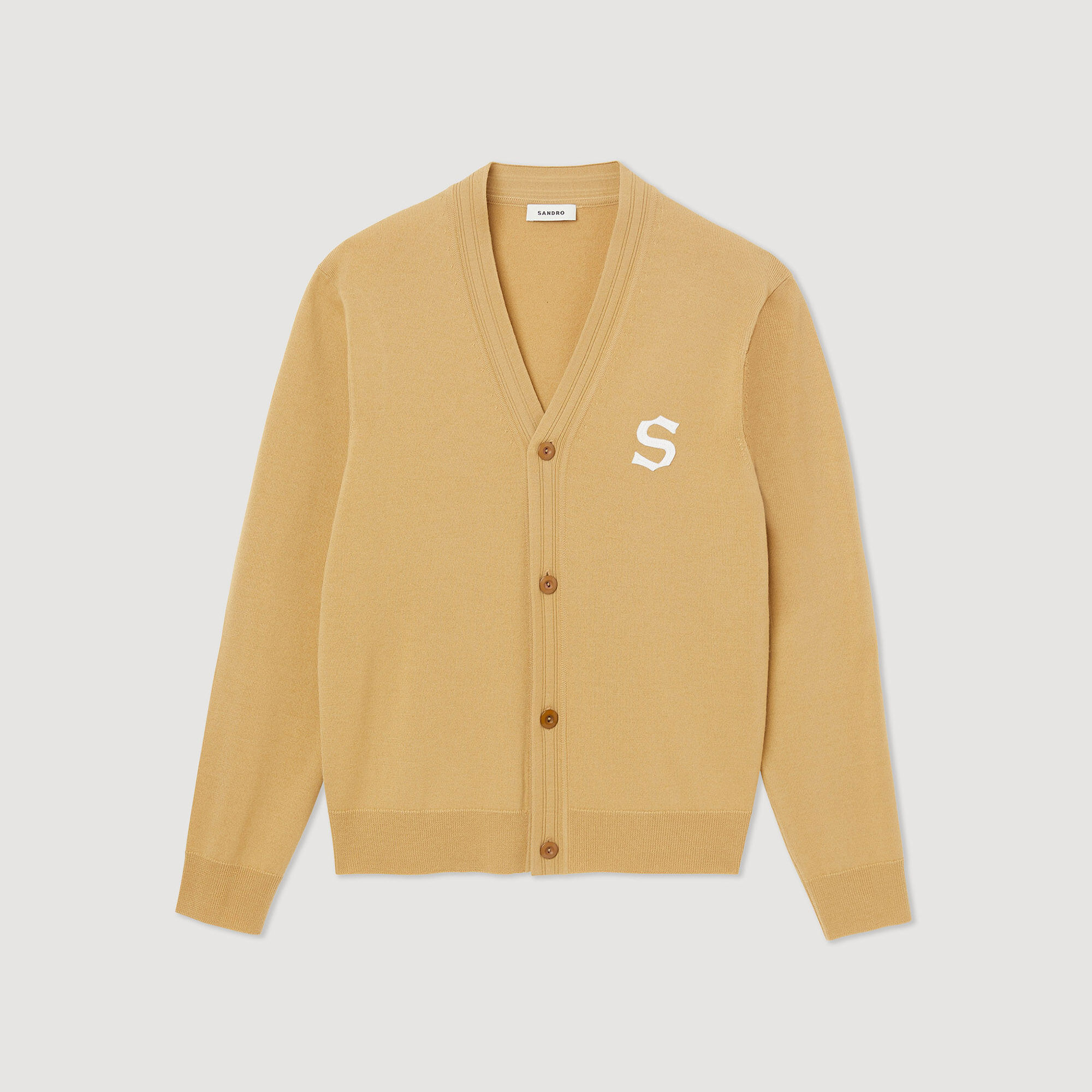 Wool cardigan with S patch