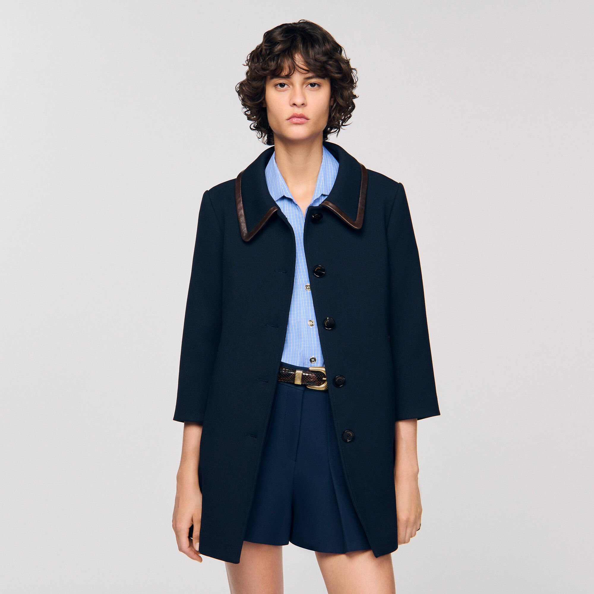 Coat with leather stripes