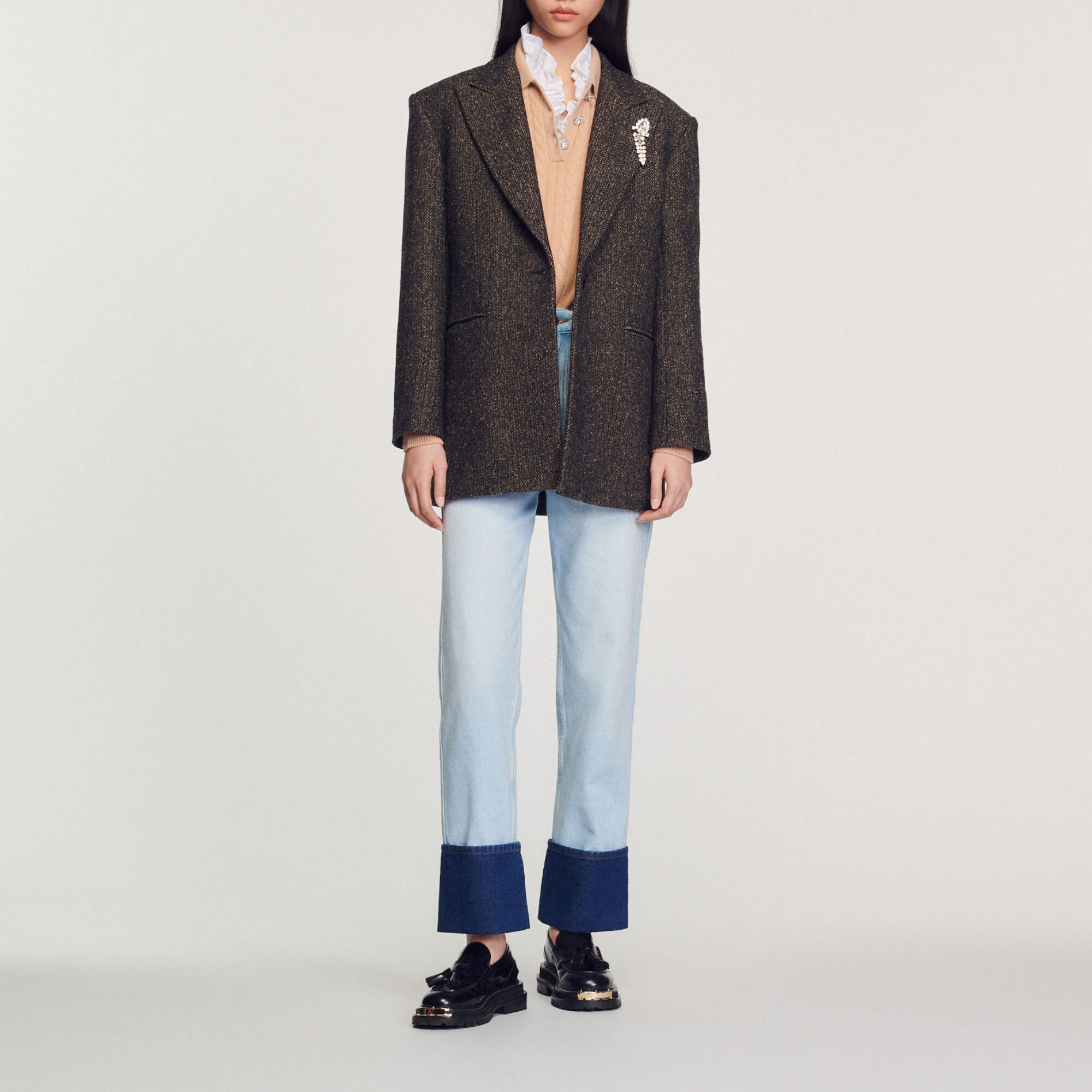 Tailored jacket with embellished brooch