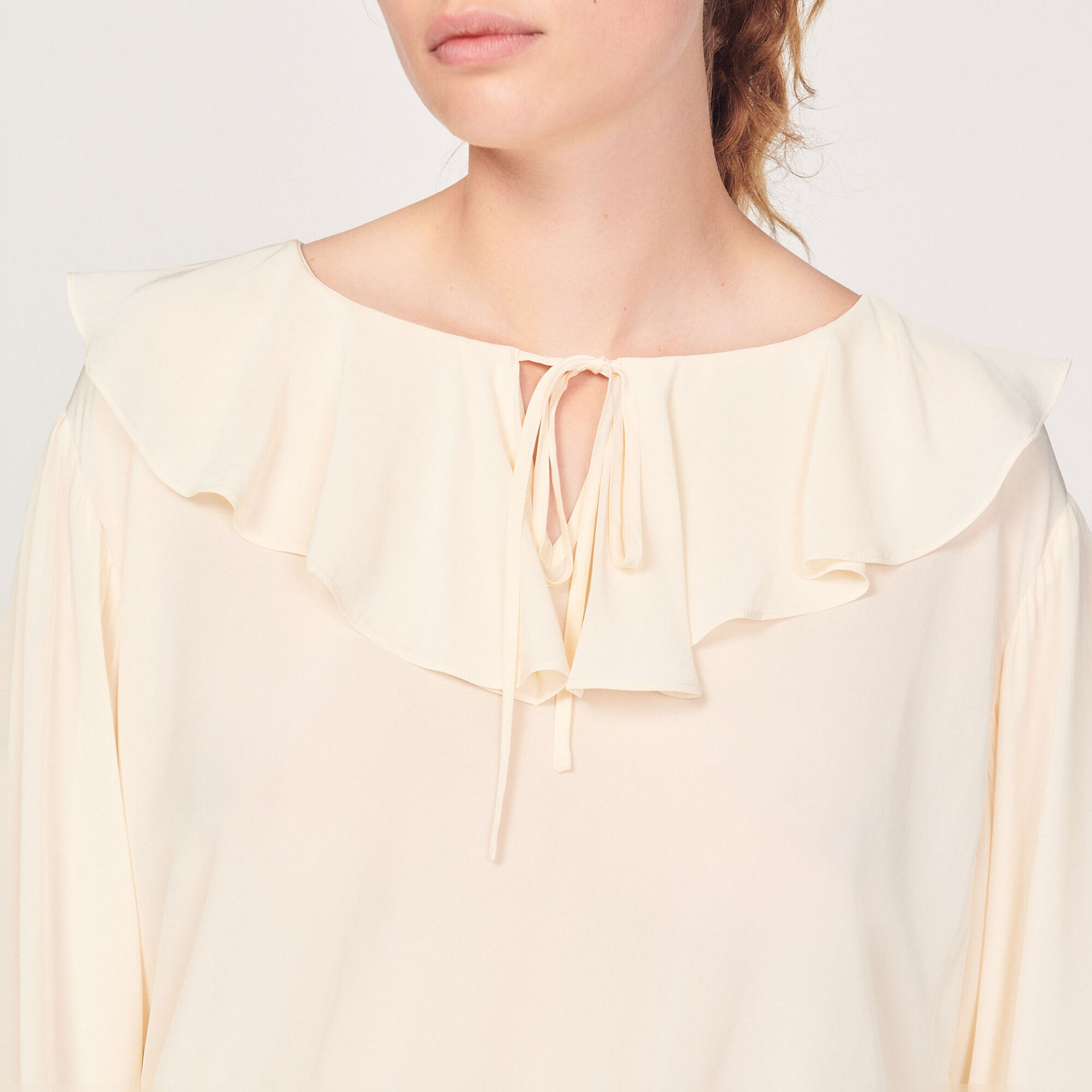 Flowing ruffled blouse