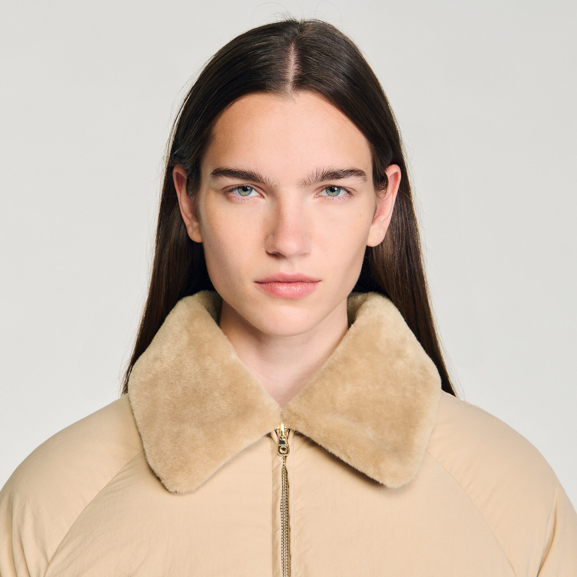 Puffer jacket with shearling collar