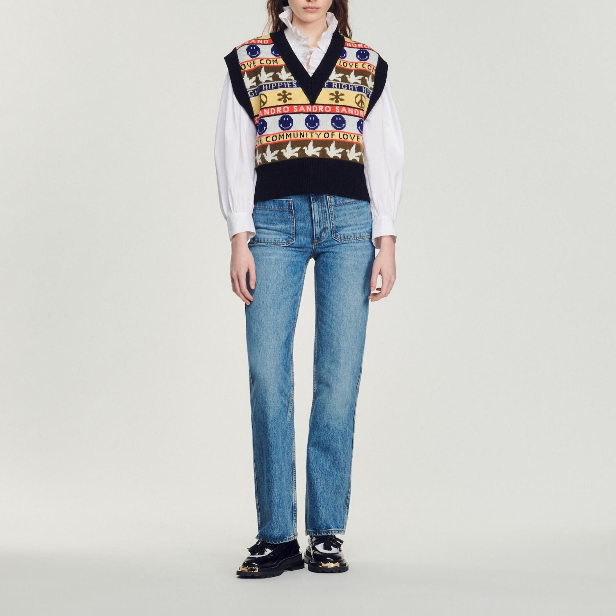 Sleeveless sweater with motif