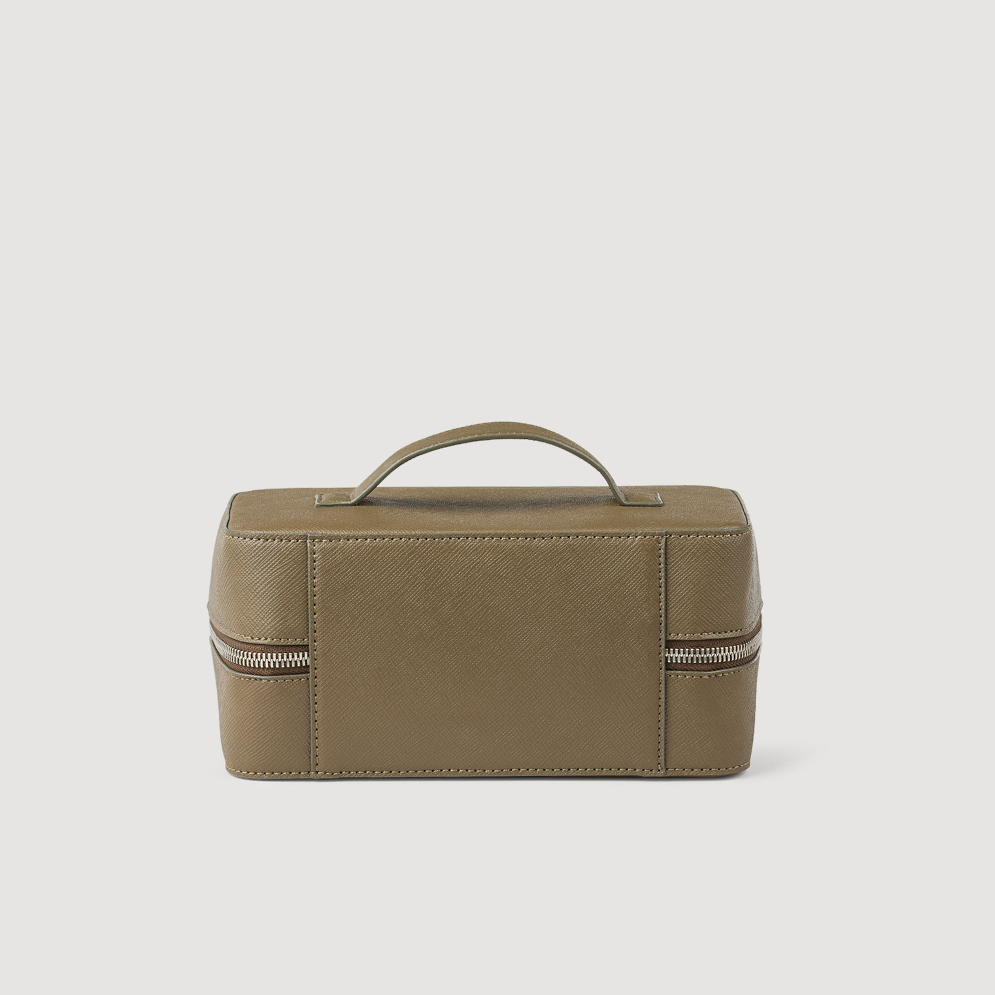 Toilet bag in reconstituted leather