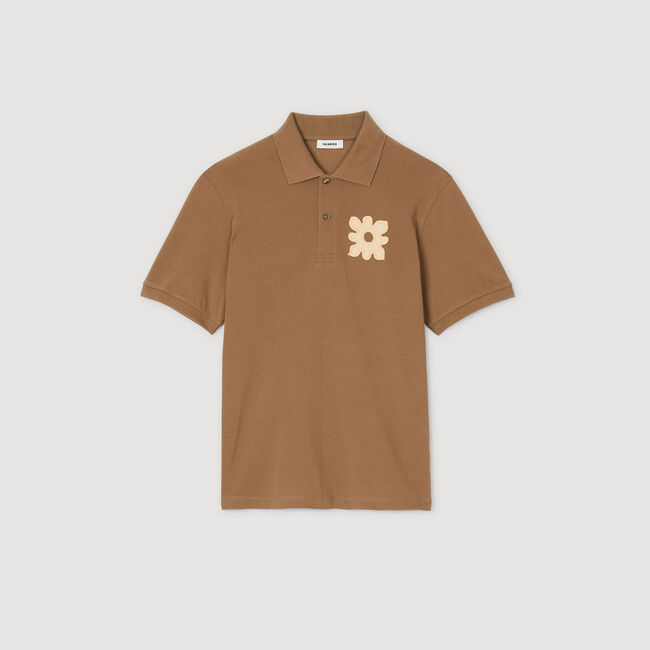 Polo shirt with flower patch