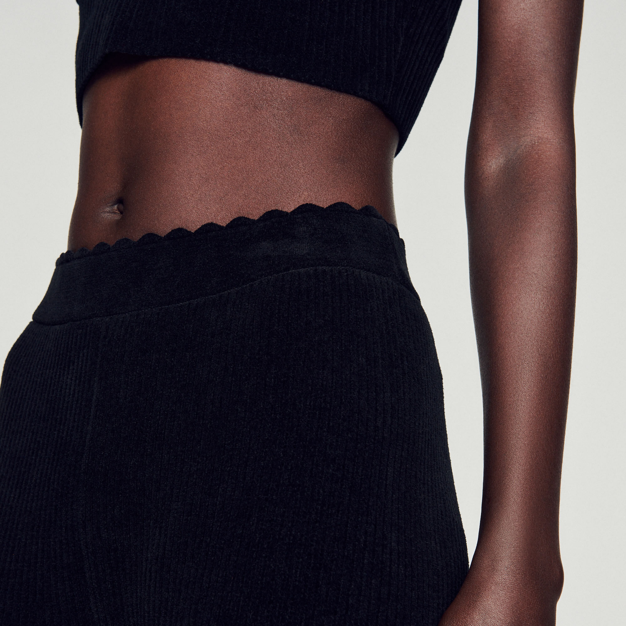 Flared velour knit trousers