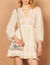 Short cut-out dress with decorative trim