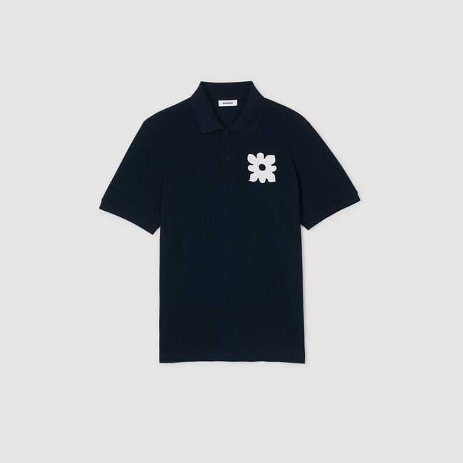 Polo shirt with flower patch