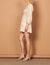 Short cut-out dress with decorative trim