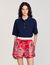 Polo shirt with decorative buttons