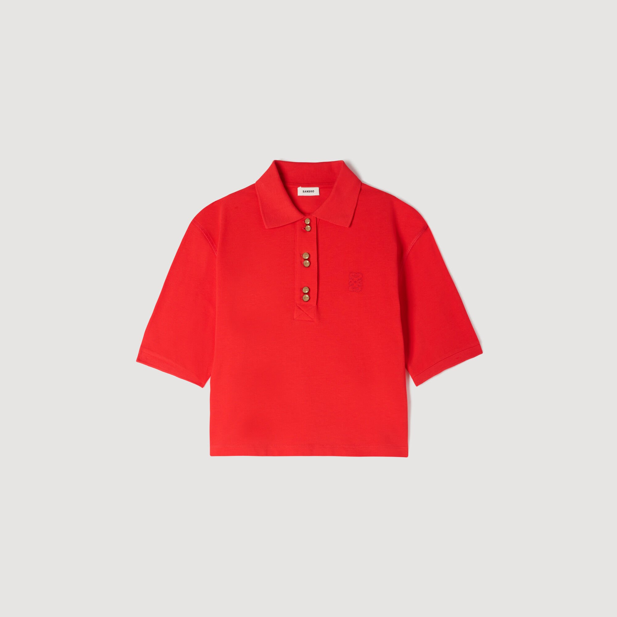 Polo shirt with decorative buttons