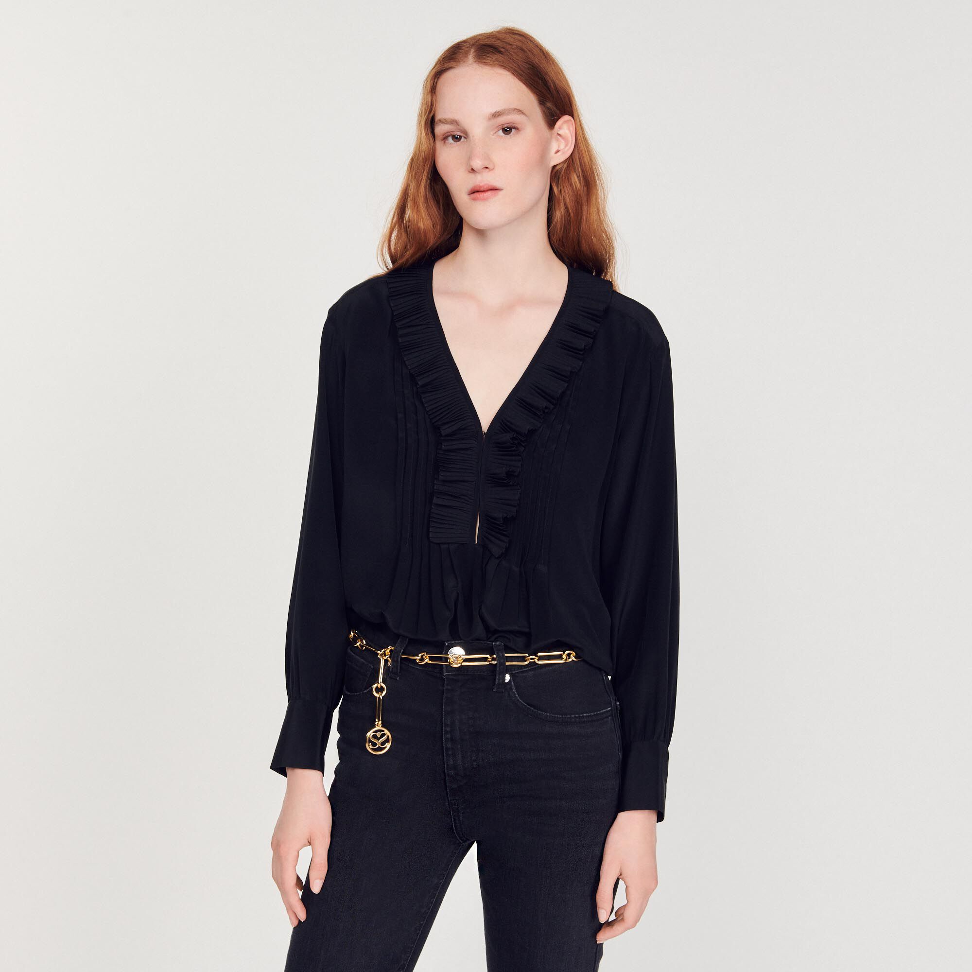 Silk top with pleat edged neckline