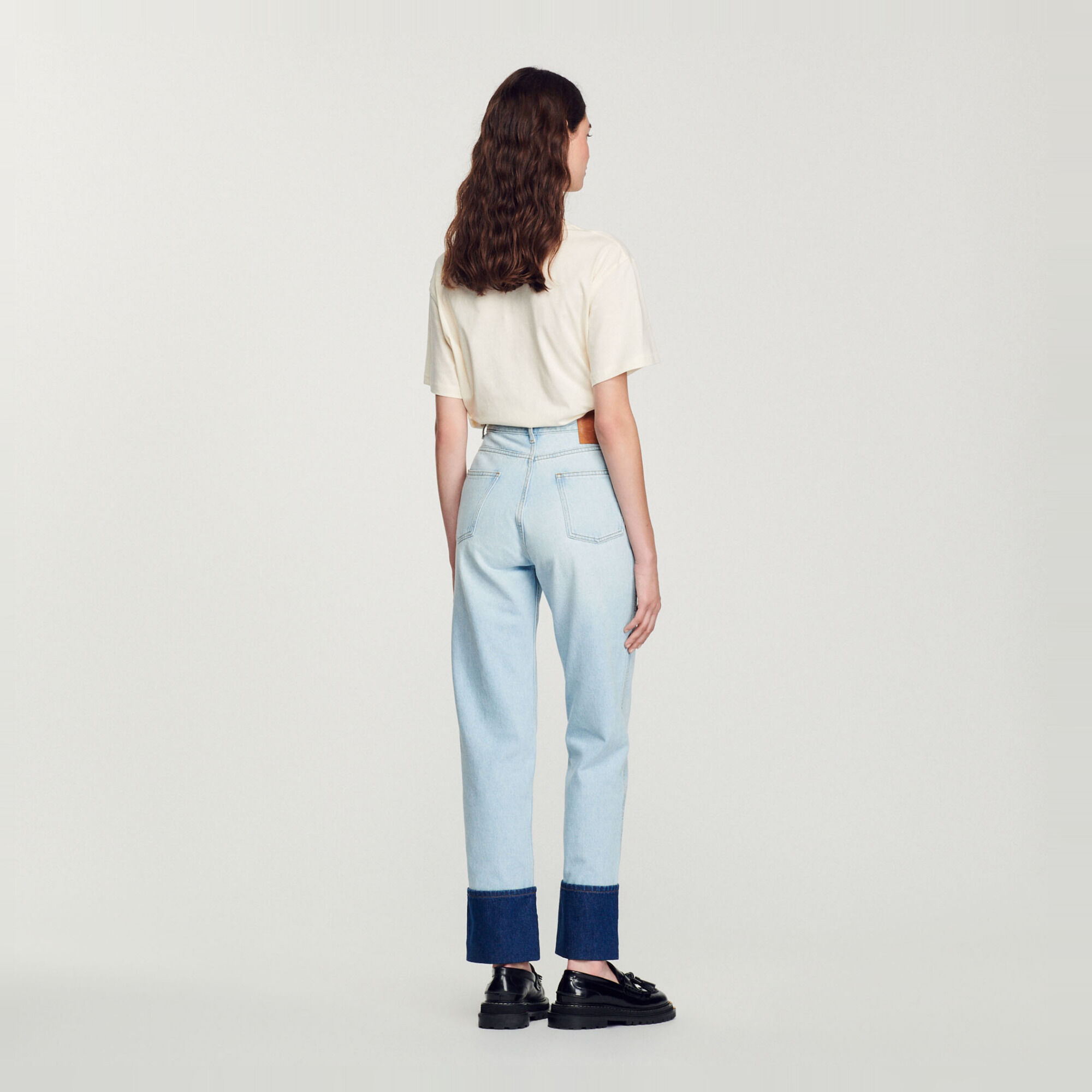 Faded jeans with contrasting cuffs