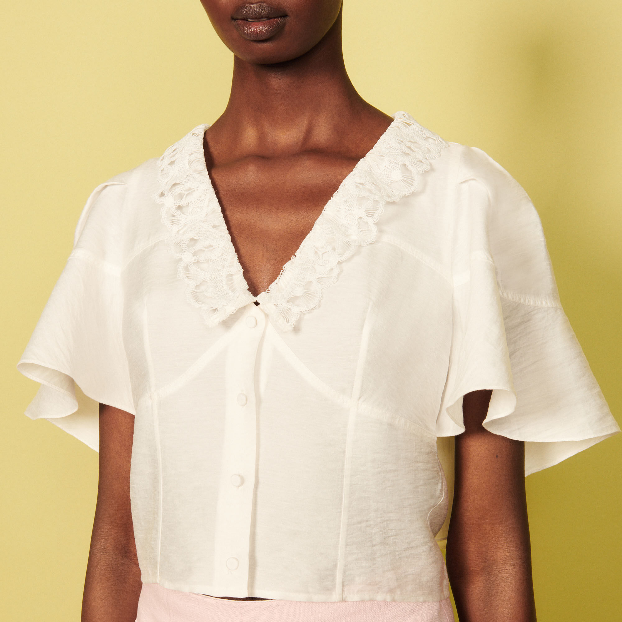 Ruffled cape blouse