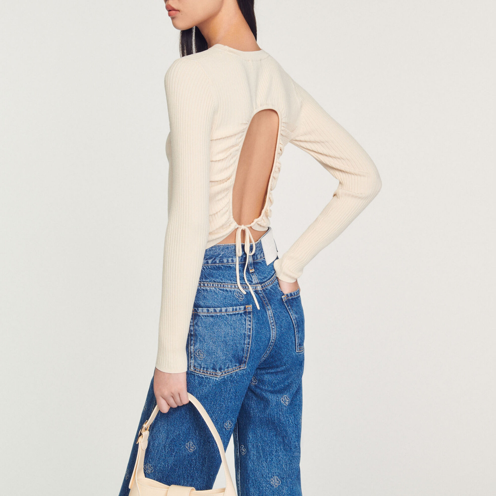Backless knit sweater