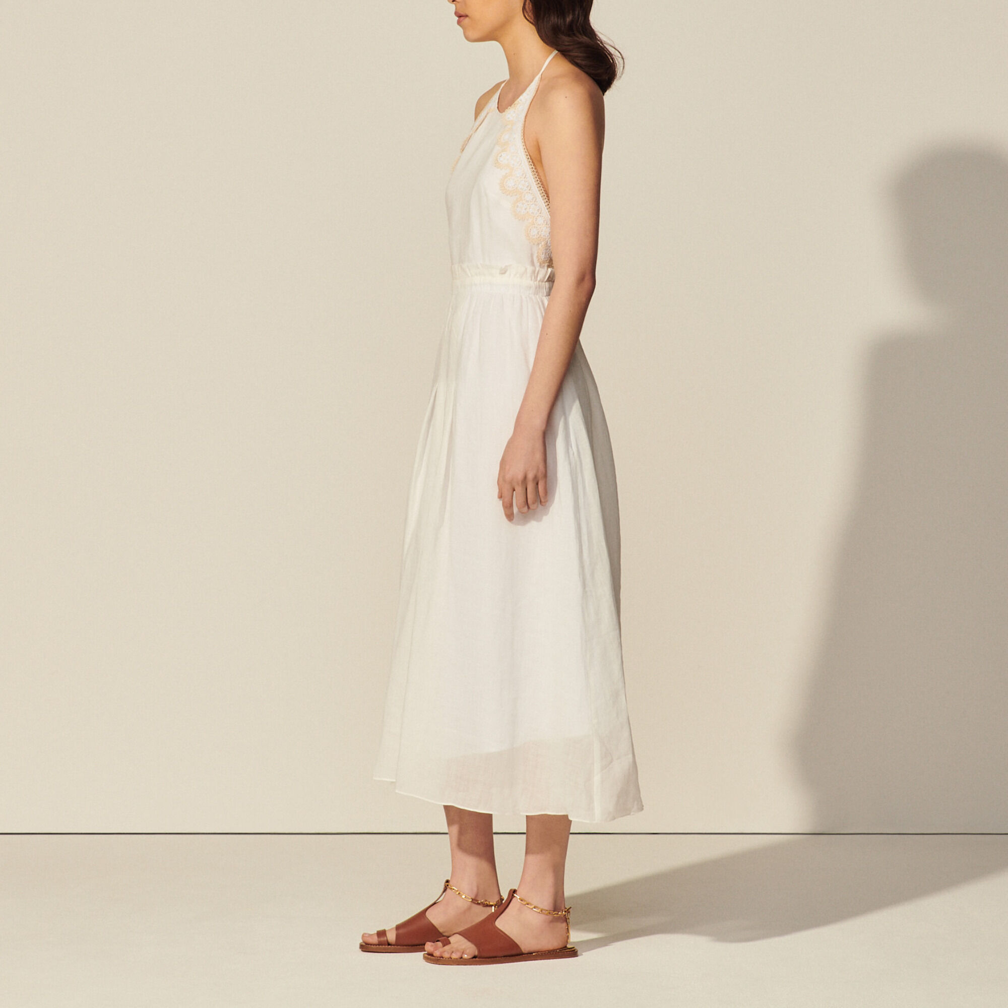 Long backless dress and lace trim