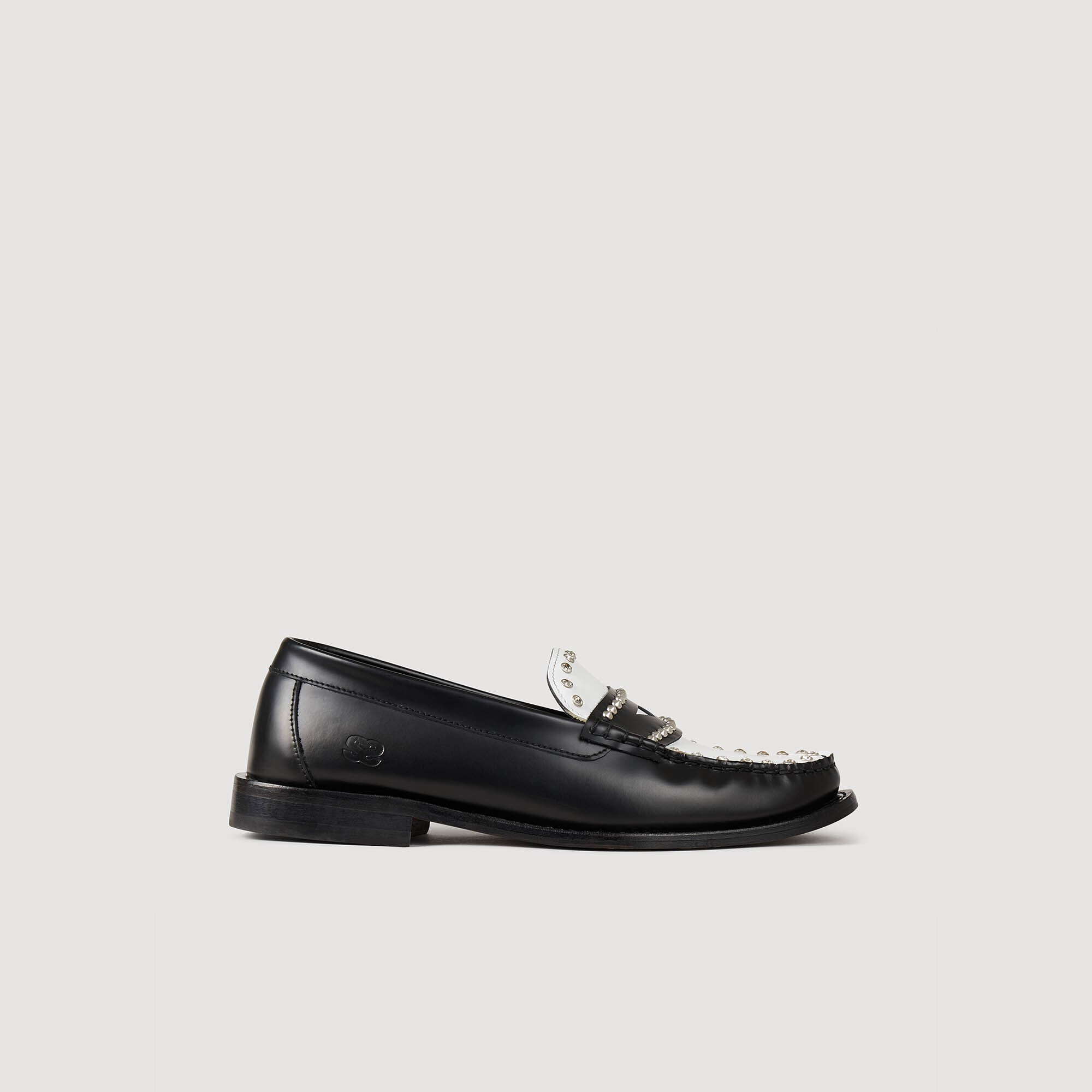 Silver and black store loafers