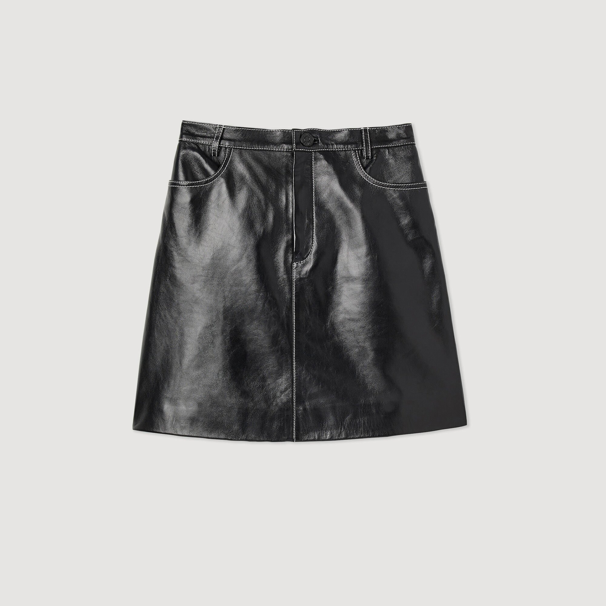 Short topstitched leather skirt