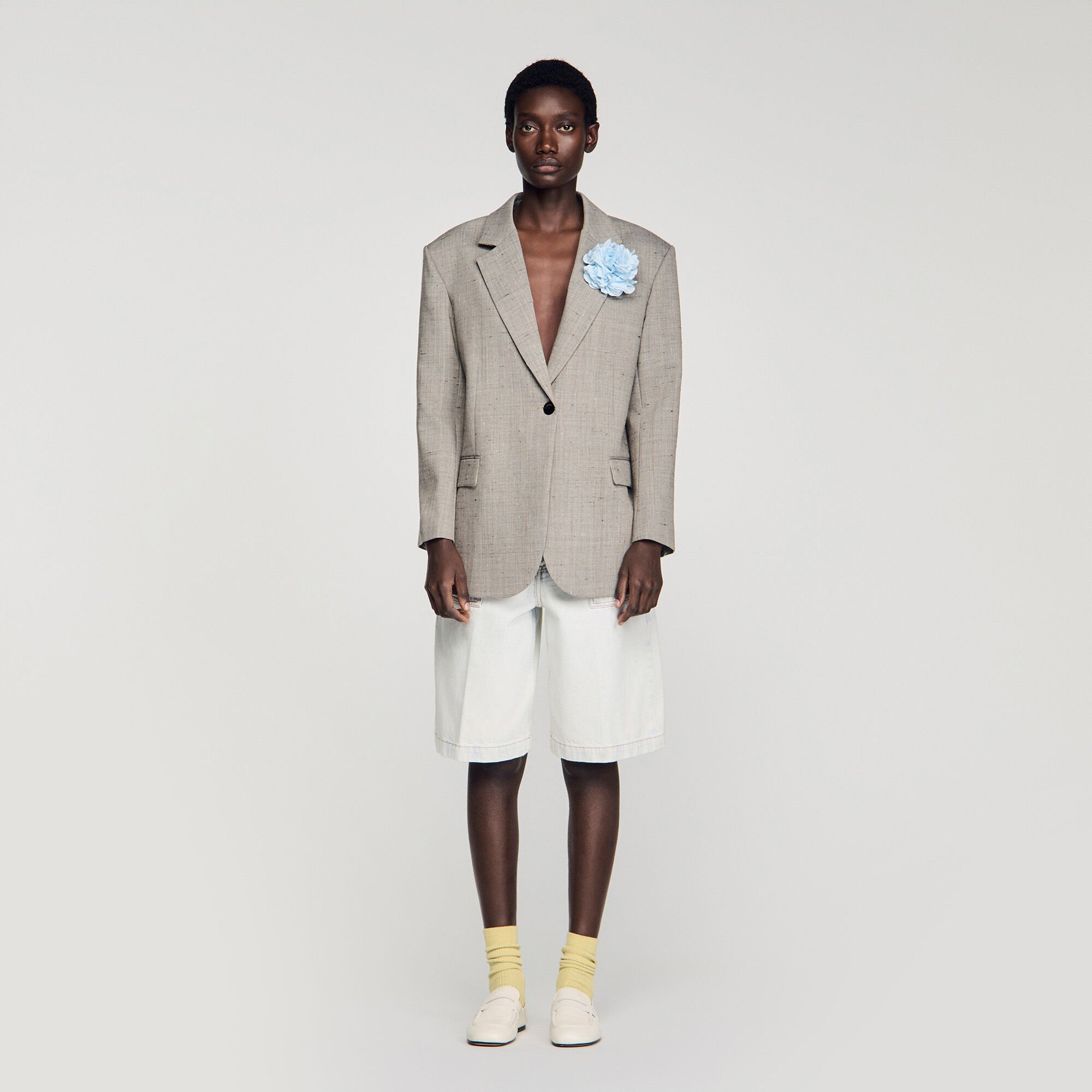 Checked wool jacket with brooch