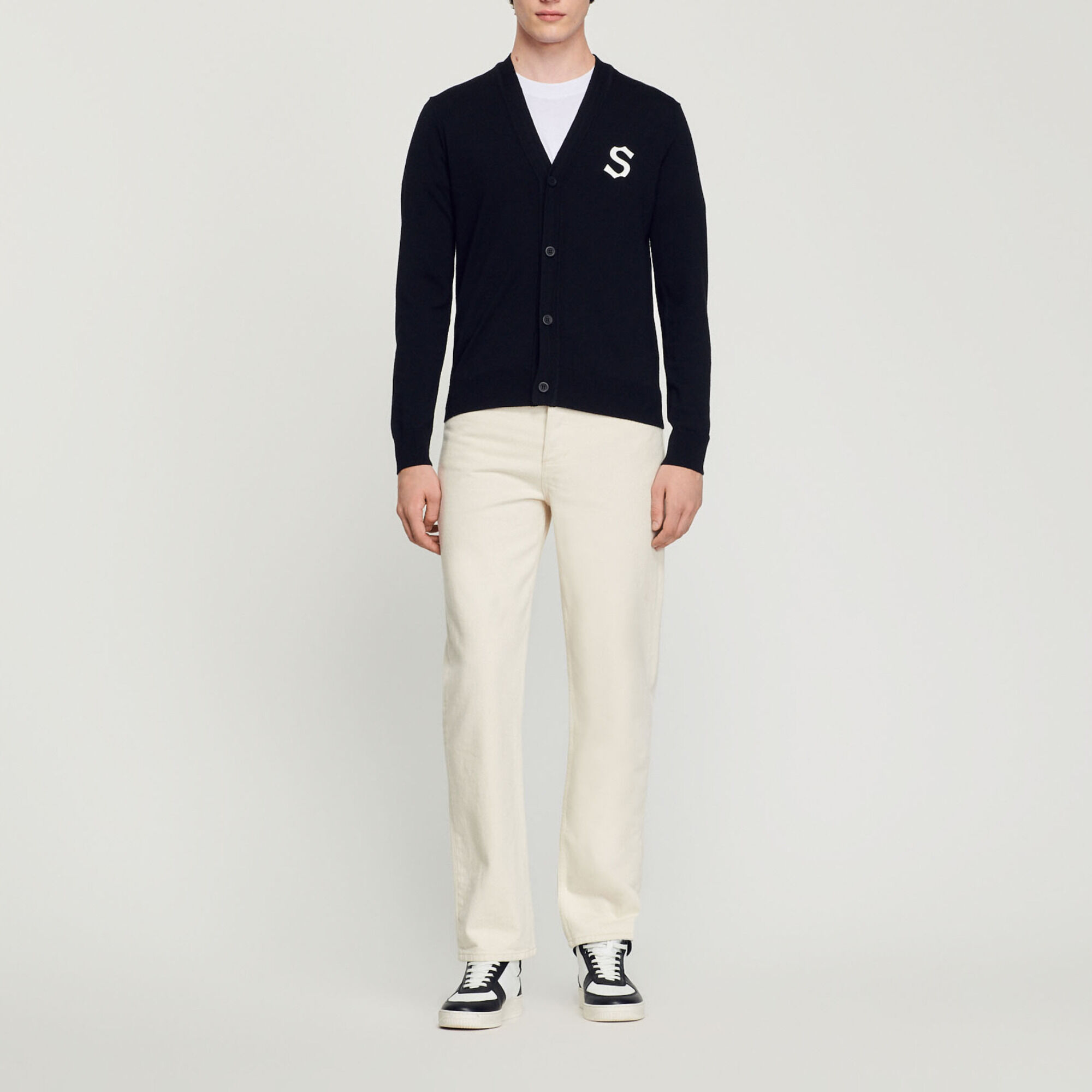 Wool cardigan with S patch