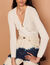 Pointelle knit sweater with ring detail