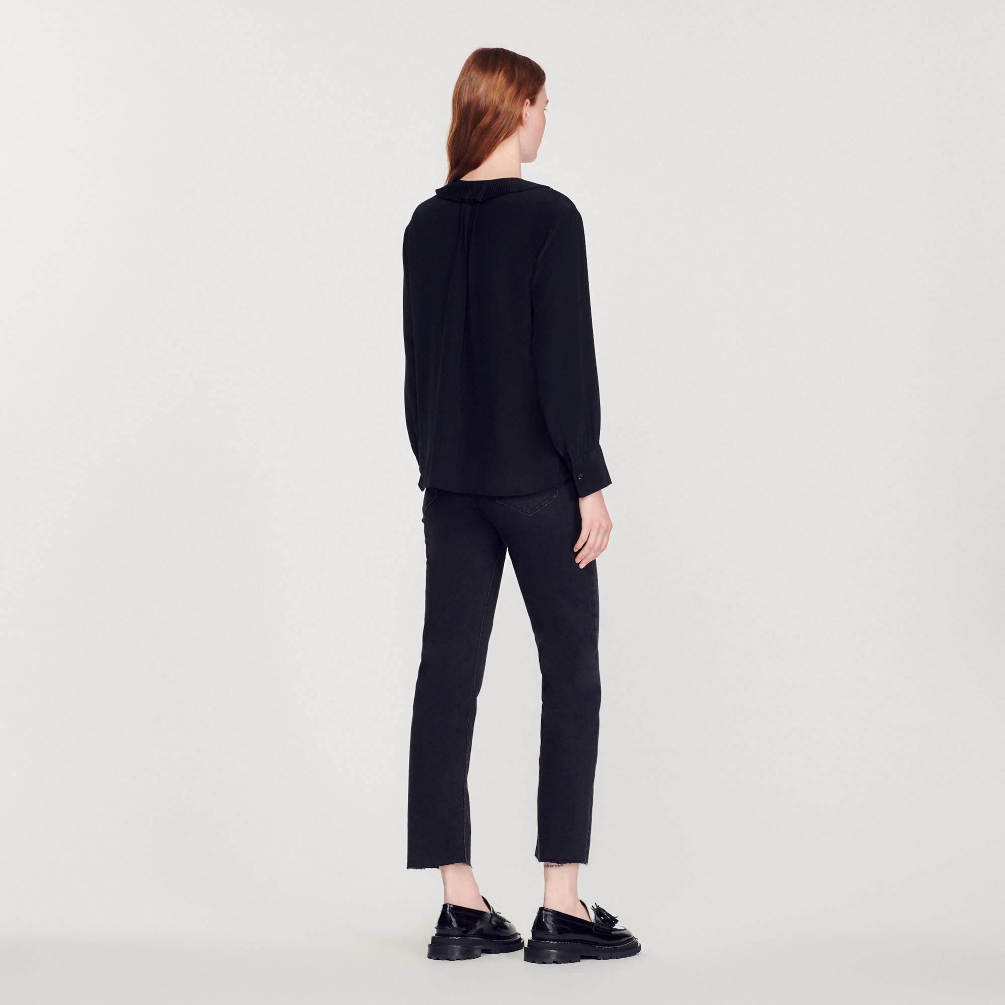 Silk top with pleat edged neckline