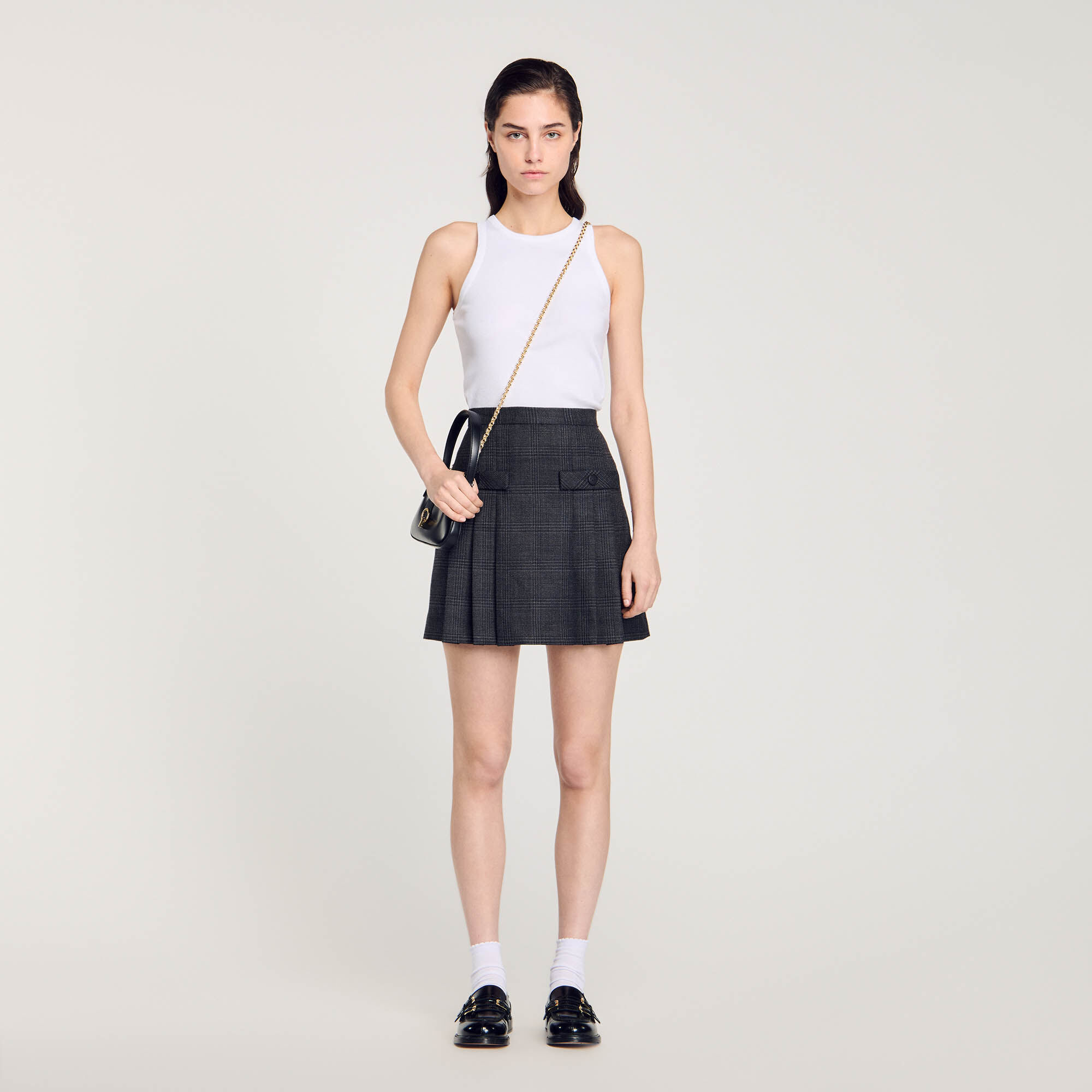 Short checked pleated skirt