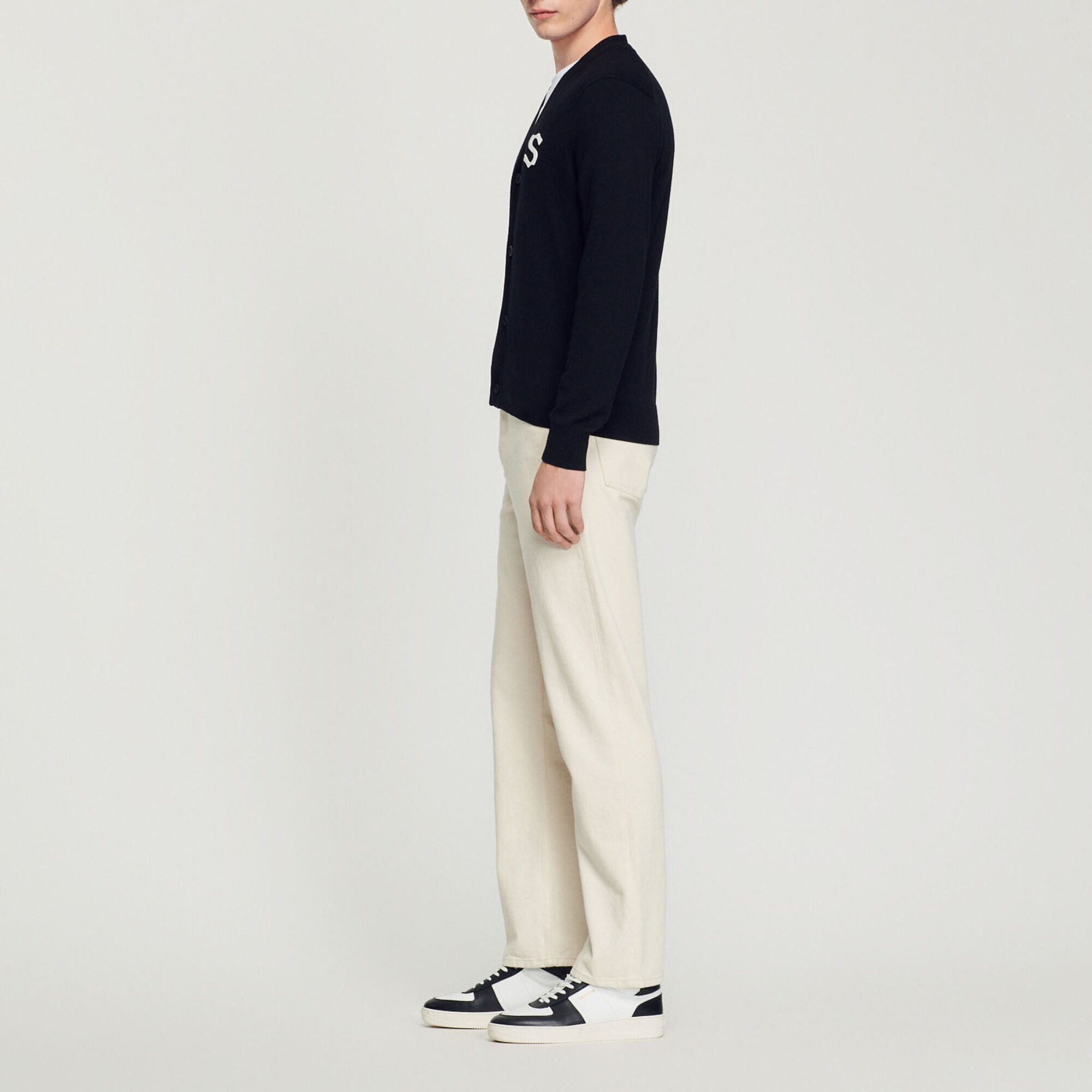 Wool cardigan with S patch