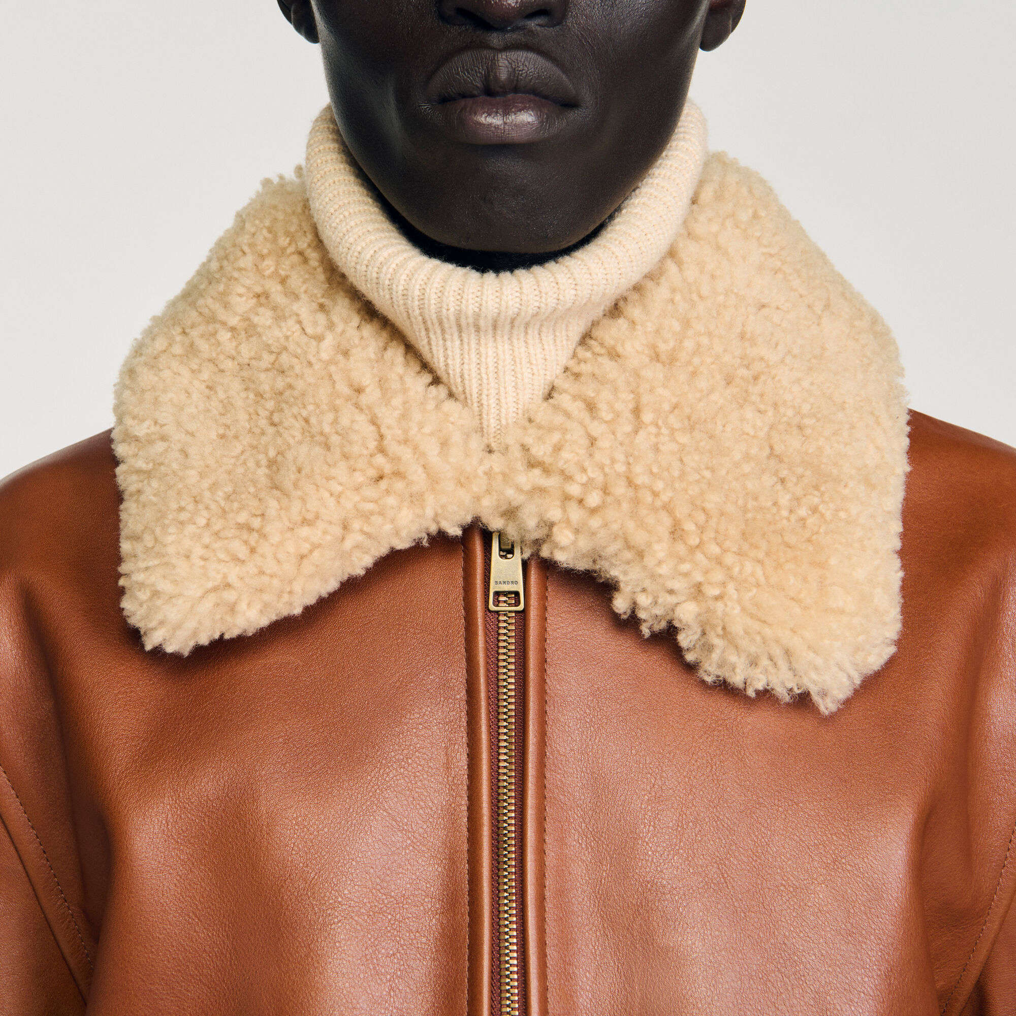 Leather jacket with fur collar