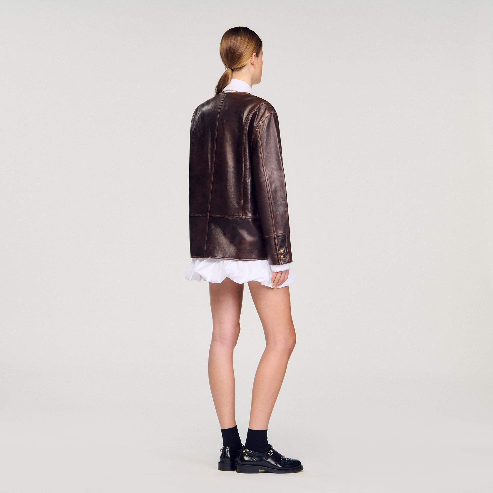 Long distressed leather jacket
