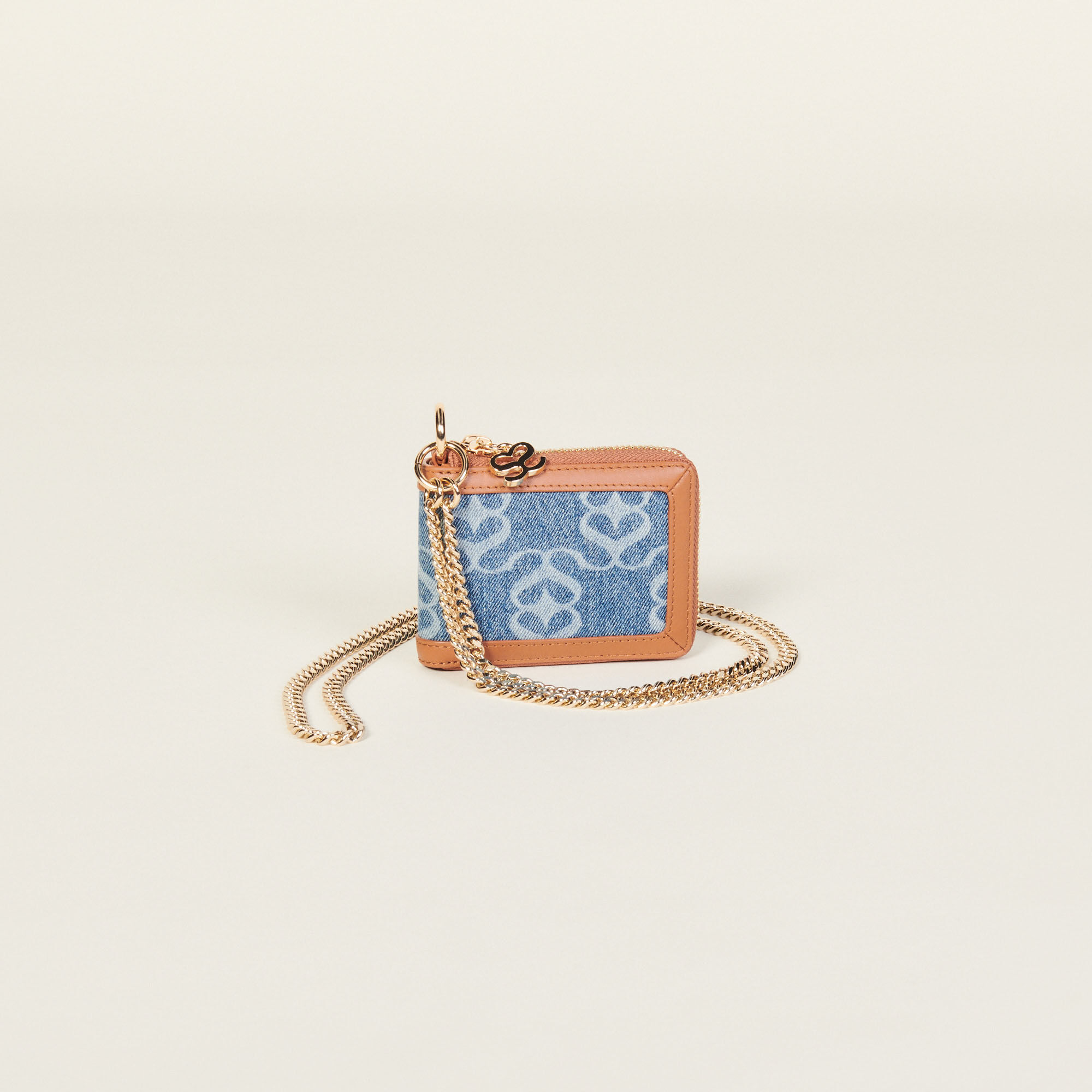 Denim and leather purse