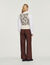 Sleeveless sweater with paisley print