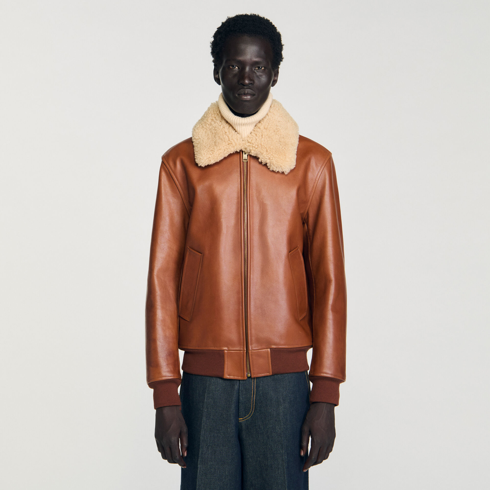 Leather jacket with fur collar