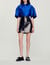 Short topstitched leather skirt
