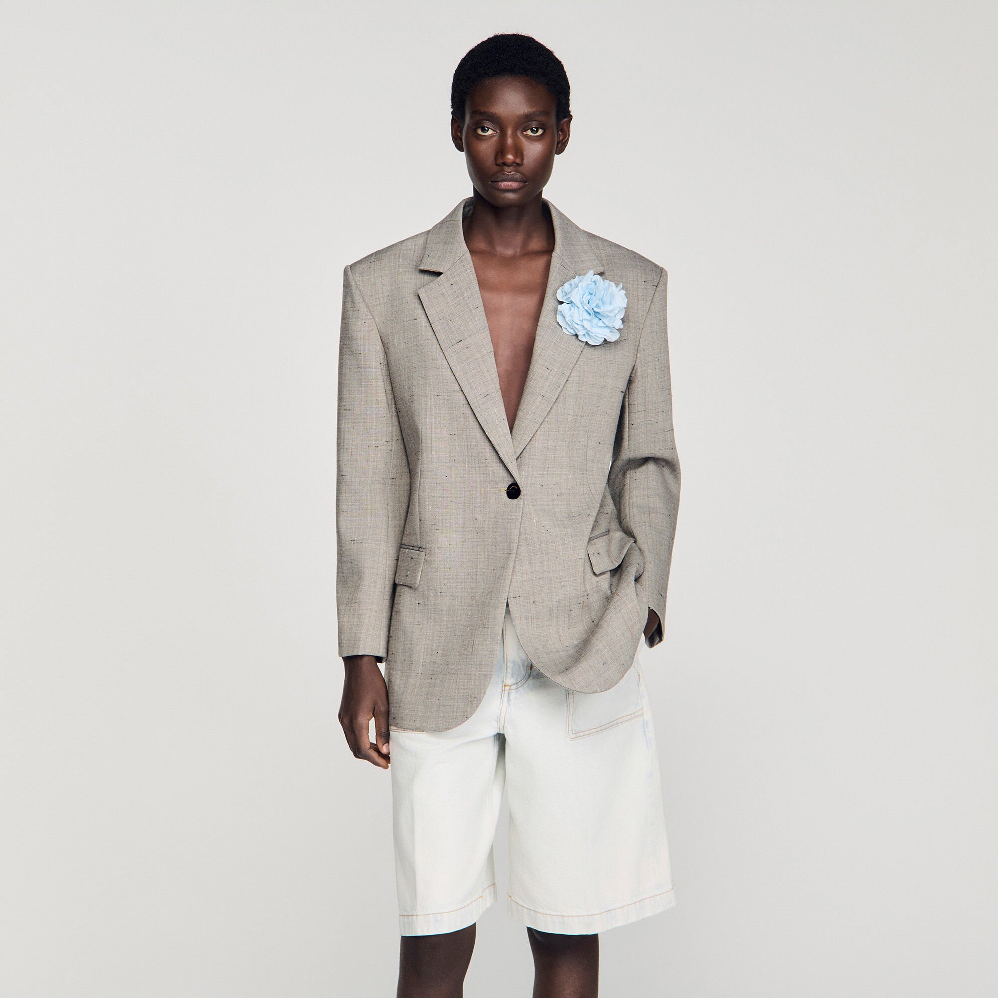 Checked wool jacket with brooch