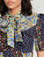Long printed dress with pussy bow collar
