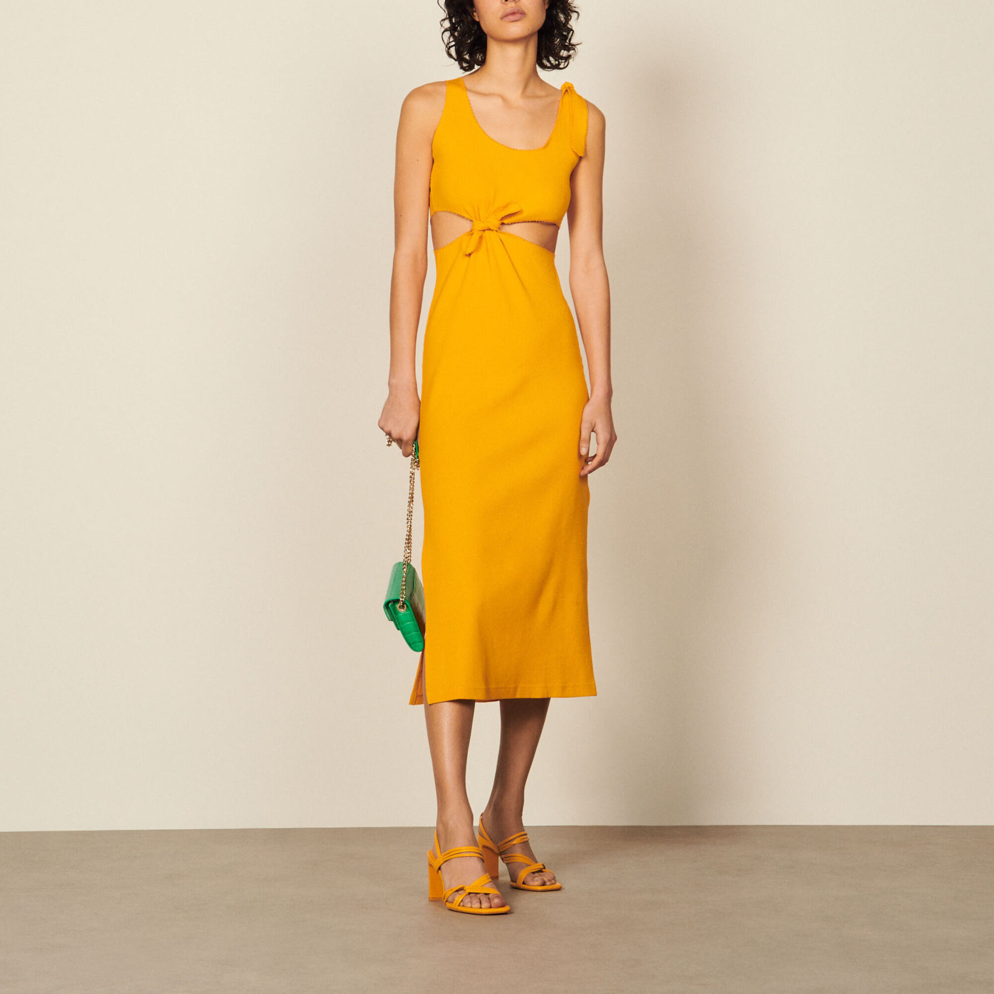 Midi dress with openwork on the sides