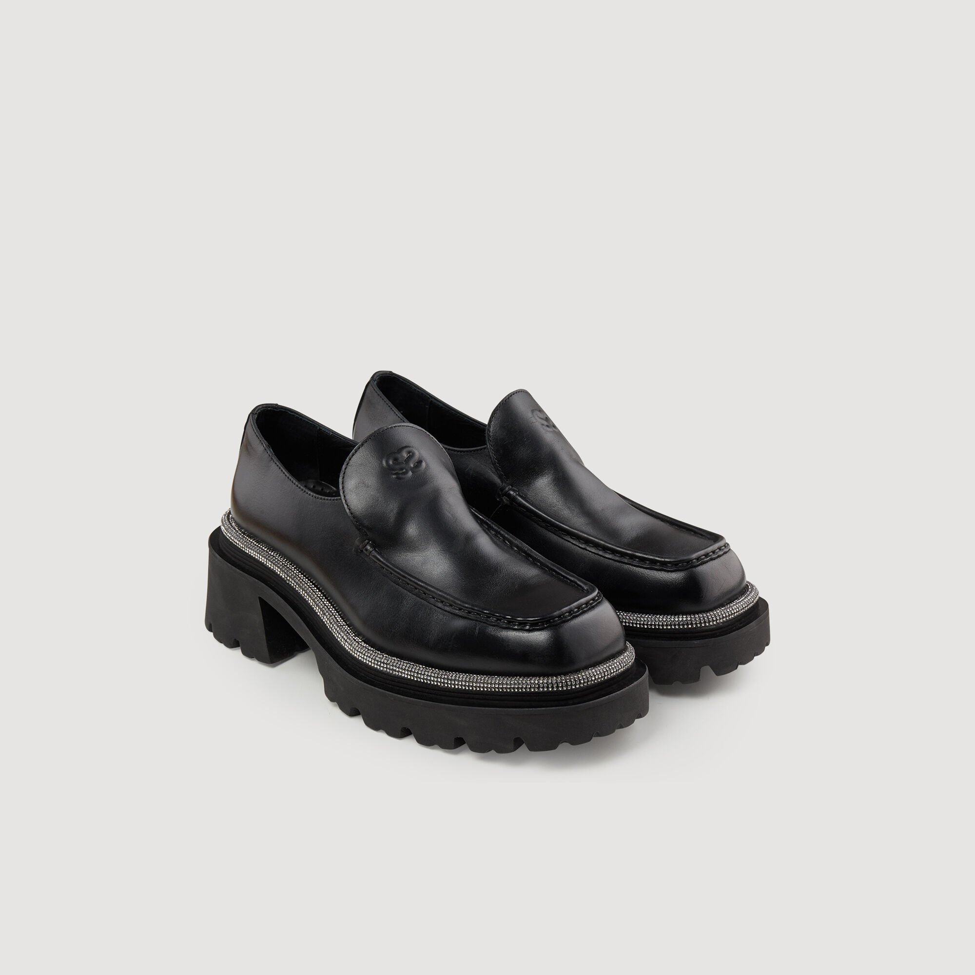 Loafers with thick notched soles