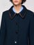 Coat with leather stripes