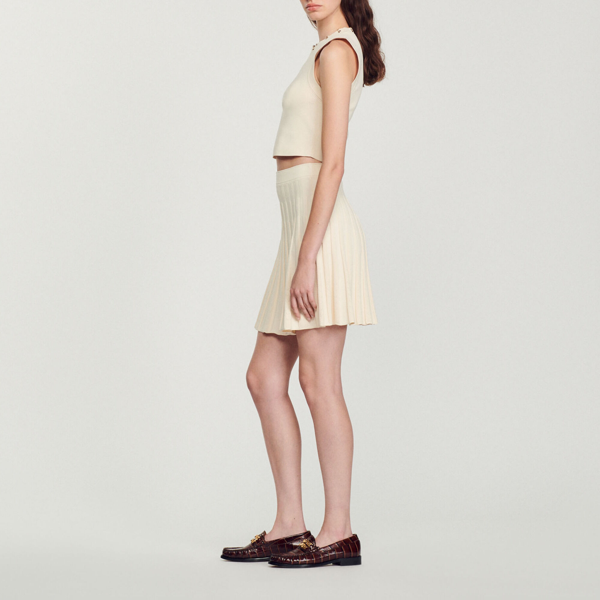 Short pleated knit skirt