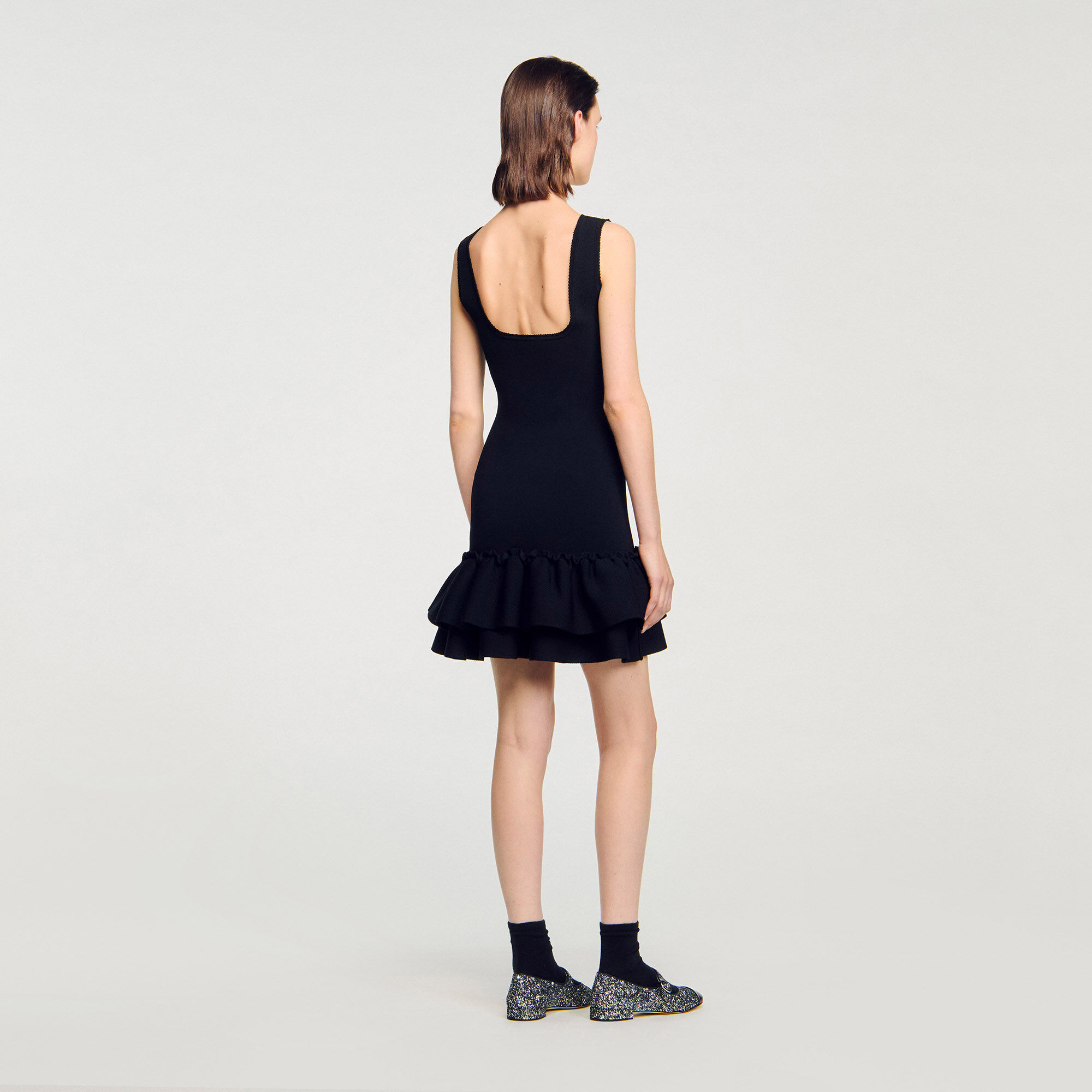 Short knit dress with ruffles